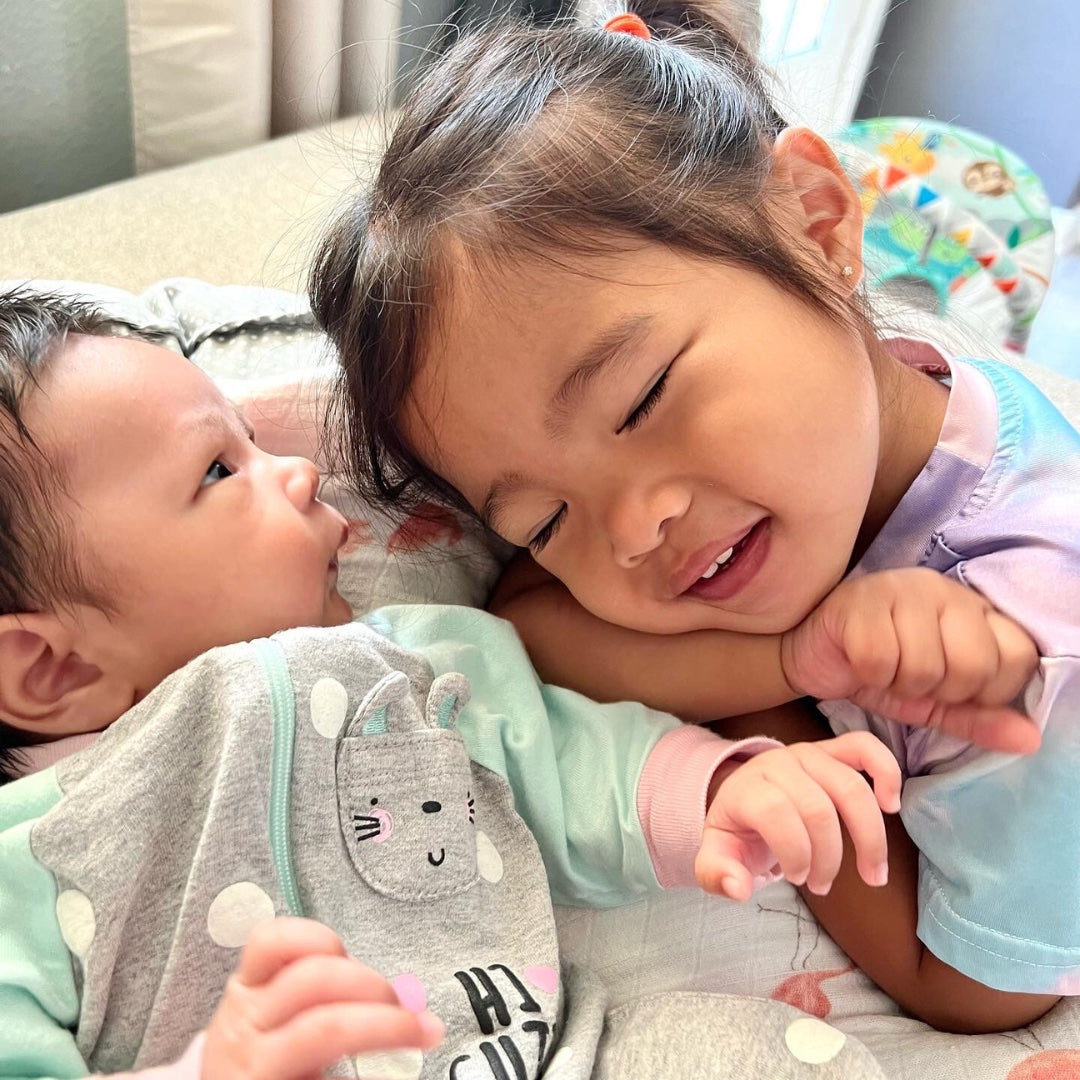 Sisterly bond, how I introduced my 15 month toddler to her baby in the bun and how it helped them bond as siblings.